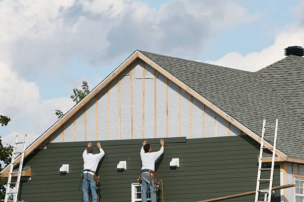 Professional Siding Installation technician working in Roslyn, PA